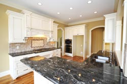 Black Granite kitchen white cabinets - MA,RI,CT St Joseph Grantie
